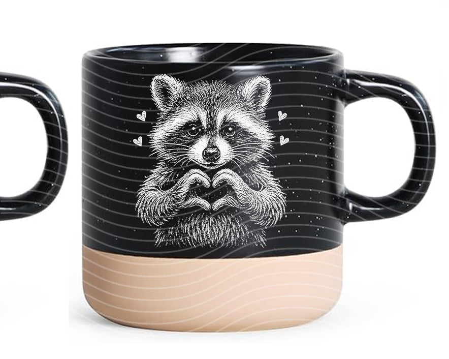 Black and White Raccoon Ceramic Mug is a ceramic mug selected for coffee, tea, cocoa, desk drinks, morning routines, kitchen shelves, and drinkware gifts. Ceramic drinkware styling works for coffee, tea, cocoa, desk drinks, and kitchen shelves. A giftable choice for coffee lovers, tea drinkers, teachers, coworkers, grandparents, hosts, and cozy readers. Available color options help shoppers choose the right version from the listing variants.