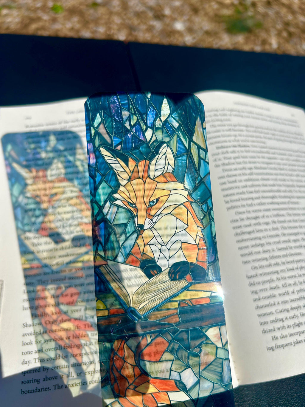 Wise Fox Bookmark with Stained Glass Forest and Open Book – Luminous Fantasy Art Celebrating Knowledge, the Sacred Power of Reading is a decorative bookmark made for readers, book lovers, collectors, book clubs, and giftable literary moments. It is designed as a reading accessory for books, journals, planners, and cozy reader gifts.
