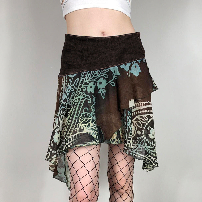 Falda de gasa de cintura alta irregular estampada con elementos retro estilo bohemio. La falda con dobladillo con vuelo tiene un temperamento que combina con todo.