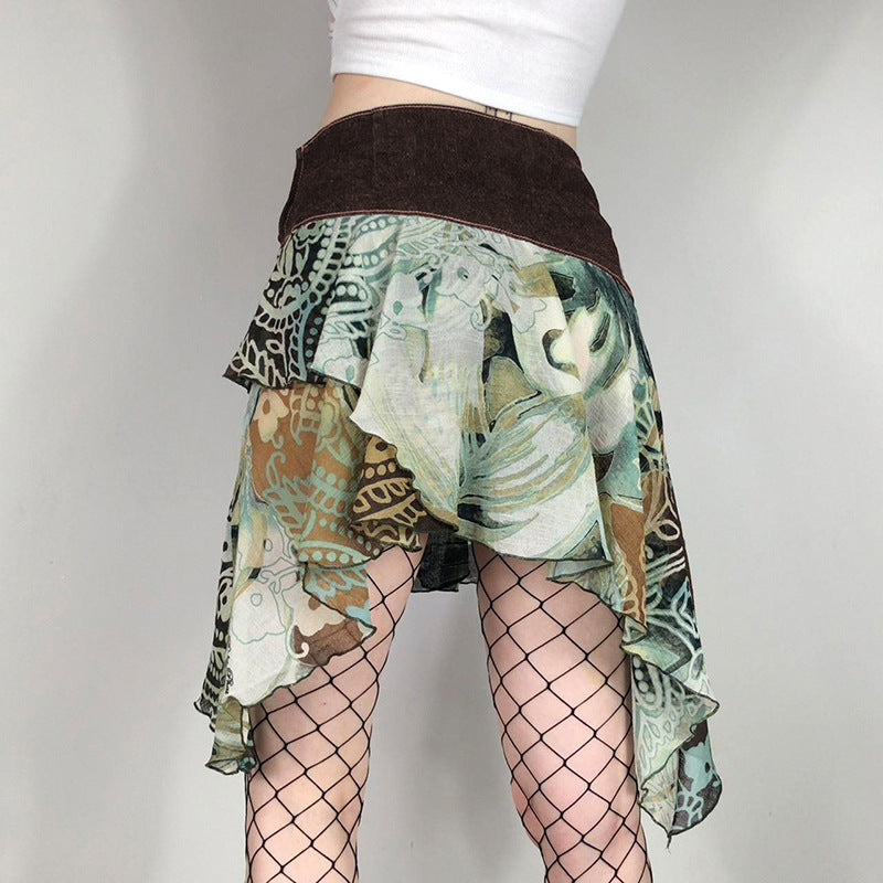 Falda de gasa de cintura alta irregular estampada con elementos retro estilo bohemio. La falda con dobladillo con vuelo tiene un temperamento que combina con todo.