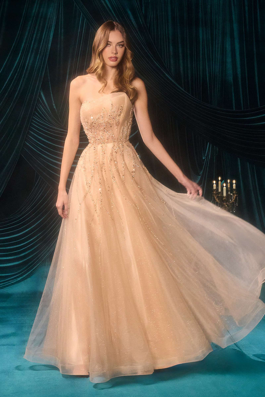 Andrea & Leo A1491 is a women’s wedding dress for prom, wedding, formal events. Source details list a Fitted pencil tea-length silhouette. Design details include Strapless sheer bodice with vertical beaded pattern and 3D floral appliqué. Fabric/material details: Beaded tulle with soft floral detailing. Fit detail: Inner structured corset, back zipper closure. Colors listed: champagne, navy blue, pink, sage green, smokey blue. Use the product options for exact color and size selection.