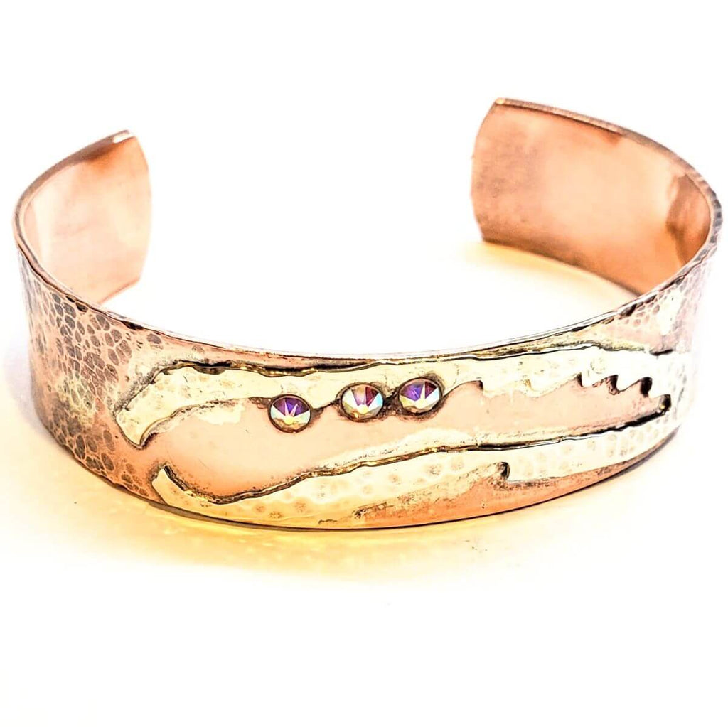 Copper Sculpted Angel Wing Frame Cuff Bracelet is handmade bracelet selected for shoppers looking for artisan jewelry, statement accessories, wearable gifts, and distinctive details. Design details include copper construction, crystal or rhinestone accents, hammered texture, angel wing shape. Available style options help shoppers choose the right version from the listing variants.