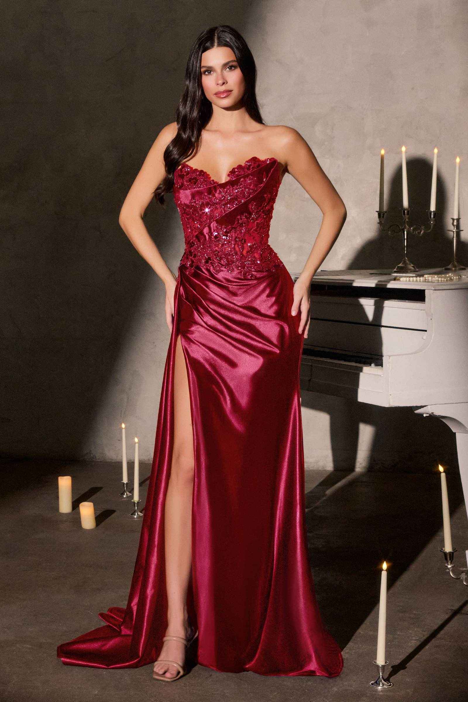 Cinderella Divine CDS567 is a women’s prom gown for prom, formal events, pageants. Source details list a Fitted silhouette. Design details include Strapless sweetheart neckline, 3D floral beaded bodice, high leg slit. Fabric/material details: Beaded lace appliqué bodice over satin skirt. Fit detail: Structured bodice with zipper-back closure. Use the product options for exact color and size selection.