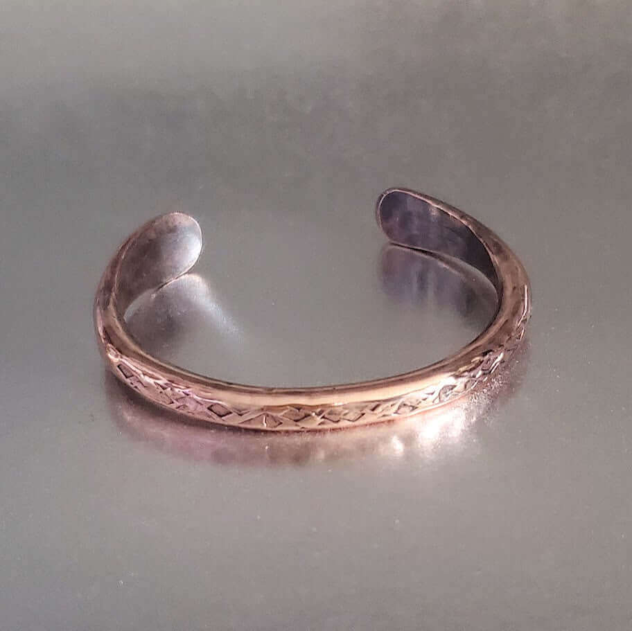 Handmade 2 ounce 6 Gauge Copper Hammered BIGGA Bangle is handmade bracelet selected for shoppers looking for artisan jewelry, statement accessories, wearable gifts, and distinctive details. Design details include copper construction, crystal or rhinestone accents, hammered texture, bead detail. Available size options help shoppers choose the right version from the listing variants.