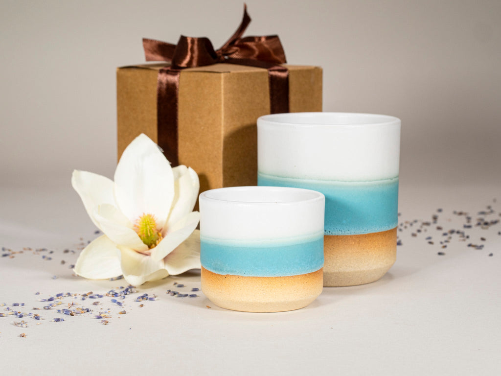 Gift Set: 14 oz cup and 5.5 oz cup in Turquoise White Stoneware is a stoneware cup gift set selected for drinkware shoppers, coffee bars, kitchen tableware, gift sets, and cozy beverage routines. Material details include 𝗦 & 𝗗𝗘𝗦𝗜𝗚𝗡 : Stoneware Clay: includes lighter and darker tones in the clay. Product details help shoppers compare the item type, style, size, and intended use before purchase.