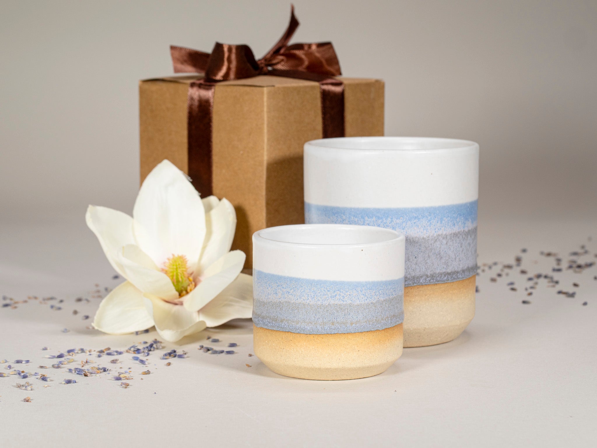 Gift Set: 14 oz cup and 5.5 oz cup in Blue Purple White Stoneware is a stoneware cup gift set selected for drinkware shoppers, coffee bars, kitchen tableware, gift sets, and cozy beverage routines. Material details include 𝗦 & 𝗗𝗘𝗦𝗜𝗚𝗡 : Stoneware Clay: includes lighter and darker tones in the clay. Product details help shoppers compare the item type, style, size, and intended use before purchase.