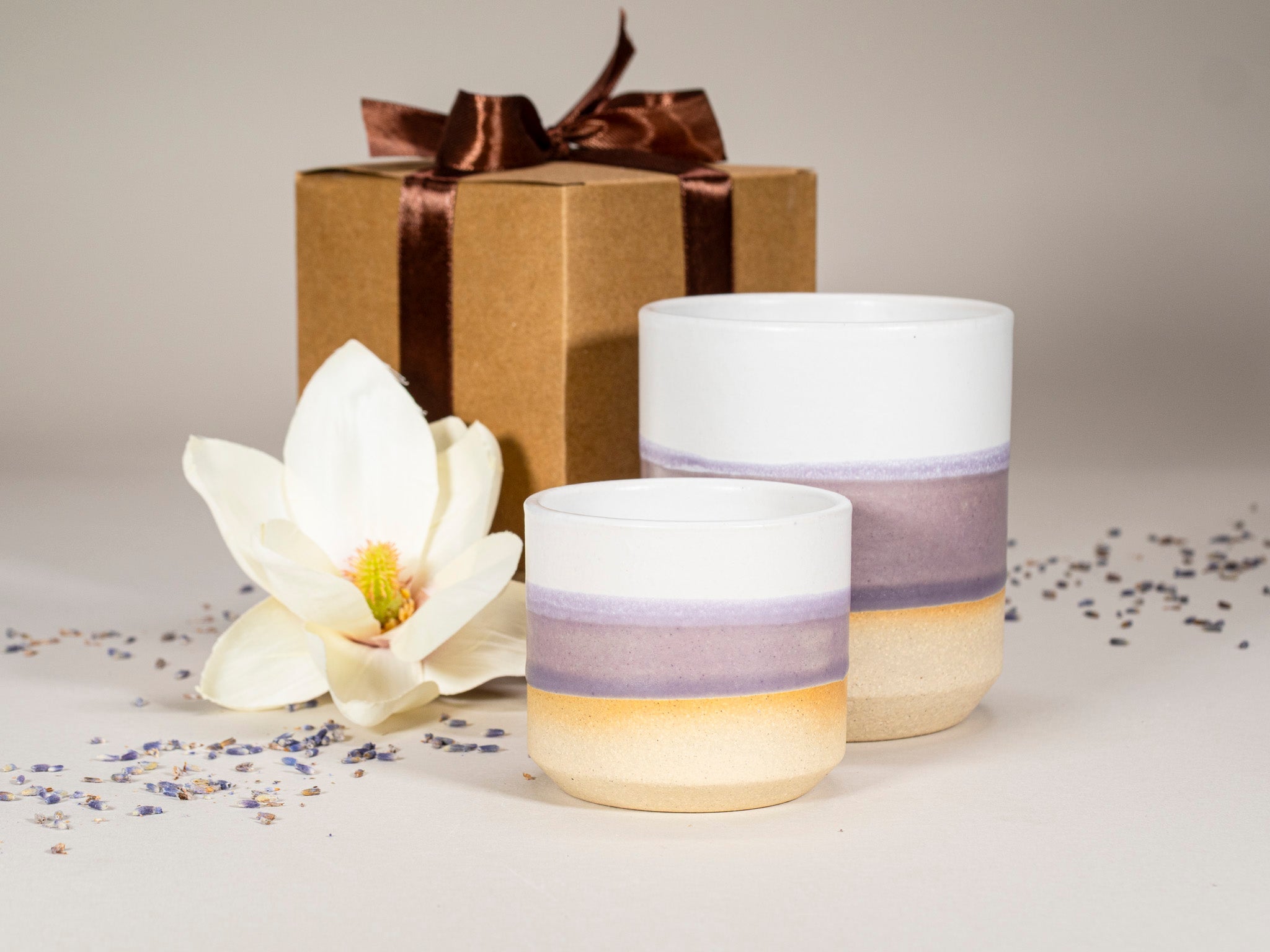 Gift Set: 14 oz cup and 5.5 oz cup in Purple White Stoneware is a stoneware cup gift set selected for drinkware shoppers, coffee bars, kitchen tableware, gift sets, and cozy beverage routines. Material details include 𝗦 & 𝗗𝗘𝗦𝗜𝗚𝗡 : Stoneware Clay: includes lighter and darker tones in the clay. Product details help shoppers compare the item type, style, size, and intended use before purchase.