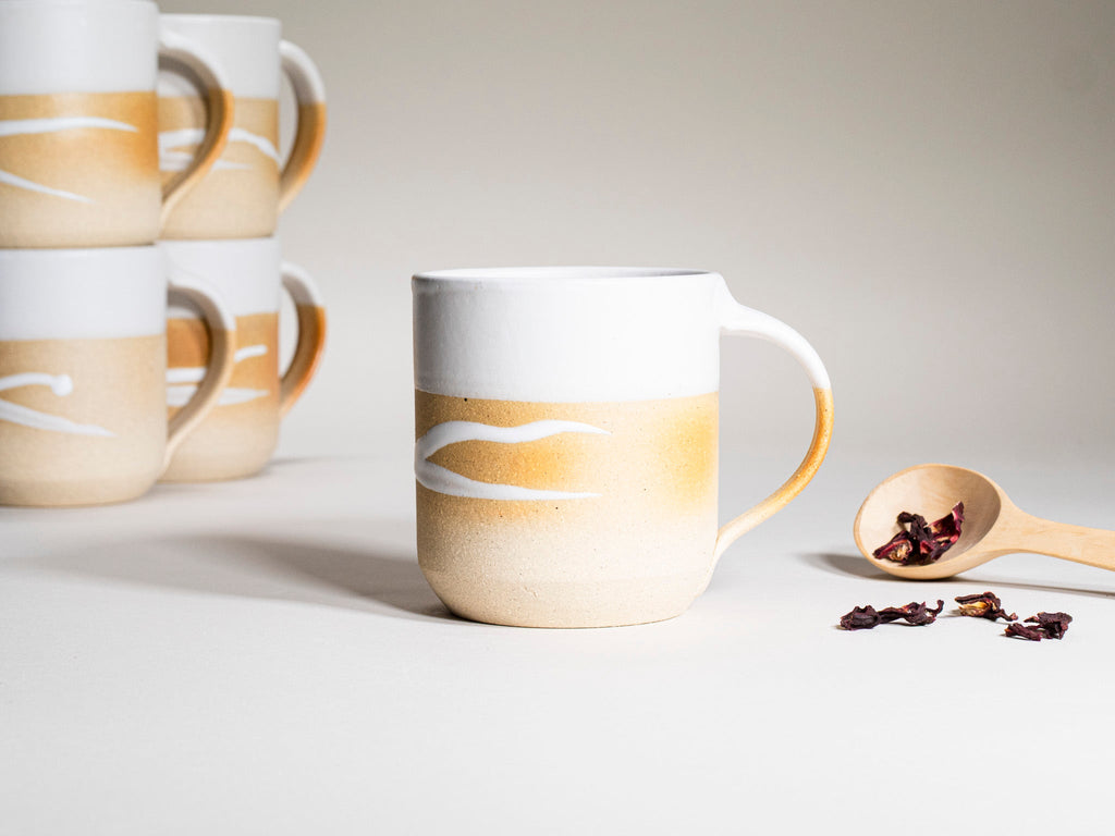 Ceramic Coffee Tea Mug with Handle Sandy White w/Trailing 14 oz Stoneware is a stoneware coffee mug selected for drinkware shoppers, coffee bars, kitchen tableware, gift sets, and cozy beverage routines. Material details include 𝗦 & 𝗗𝗘𝗦𝗜𝗚𝗡: Stoneware Clay: includes lighter and darker tones in the clay. Product details help shoppers compare the item type, style, size, and intended use before purchase.