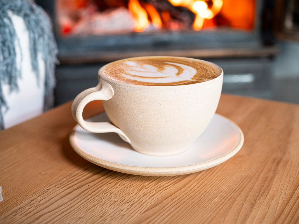 Cappuccino Cup, Latte Cup: Sandy/White, approximately 10 -12 oz, Stoneware is a stoneware latte cup selected for drinkware shoppers, coffee bars, kitchen tableware, gift sets, and cozy beverage routines. Material details include 𝗦 & 𝗗𝗘𝗦𝗜𝗚𝗡: Stoneware Clay: includes lighter and darker tones in the clay White Glaze: may vary in shades of white and speckle density Materials: free of heavy metals (e. Available style options help shoppers choose the right version from the listing variants.