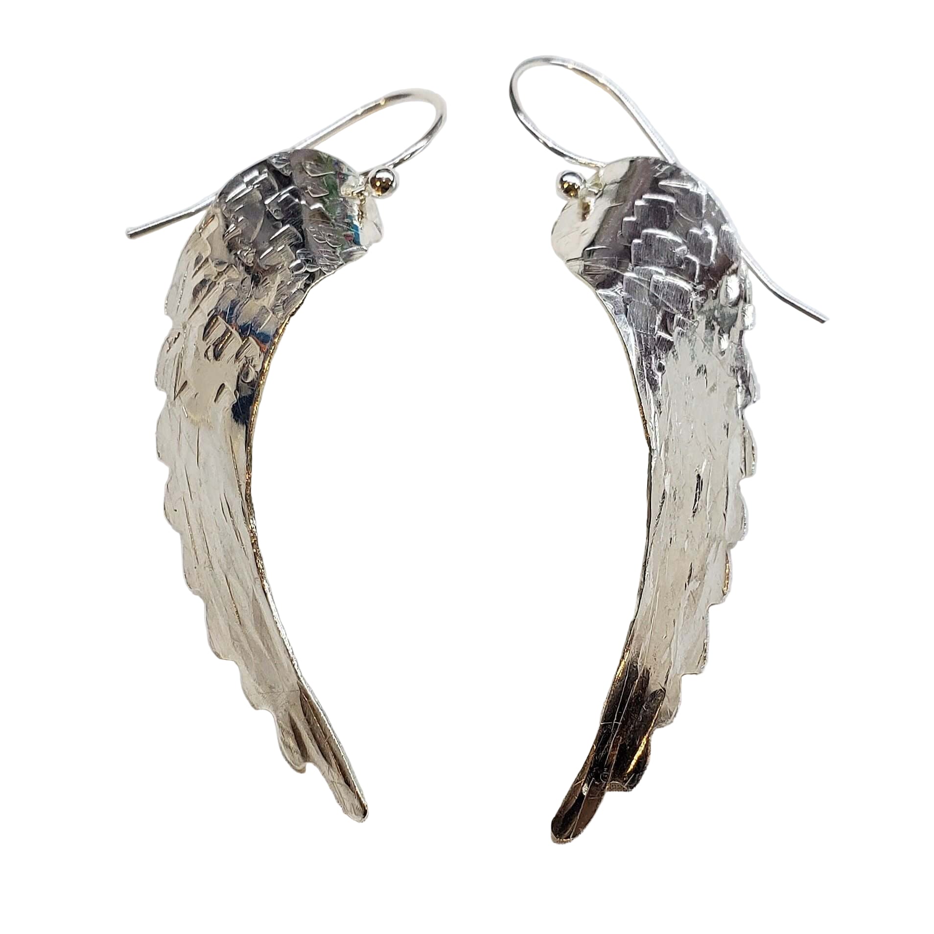 Silver Hammered Sculpted Angel Wing Earrings is handmade earrings selected for shoppers looking for artisan jewelry, statement accessories, wearable gifts, and distinctive details. Design details include silver or sterling-silver detail, hammered texture, angel wing shape. Product details help shoppers compare the item type, style, size, and intended use before purchase.