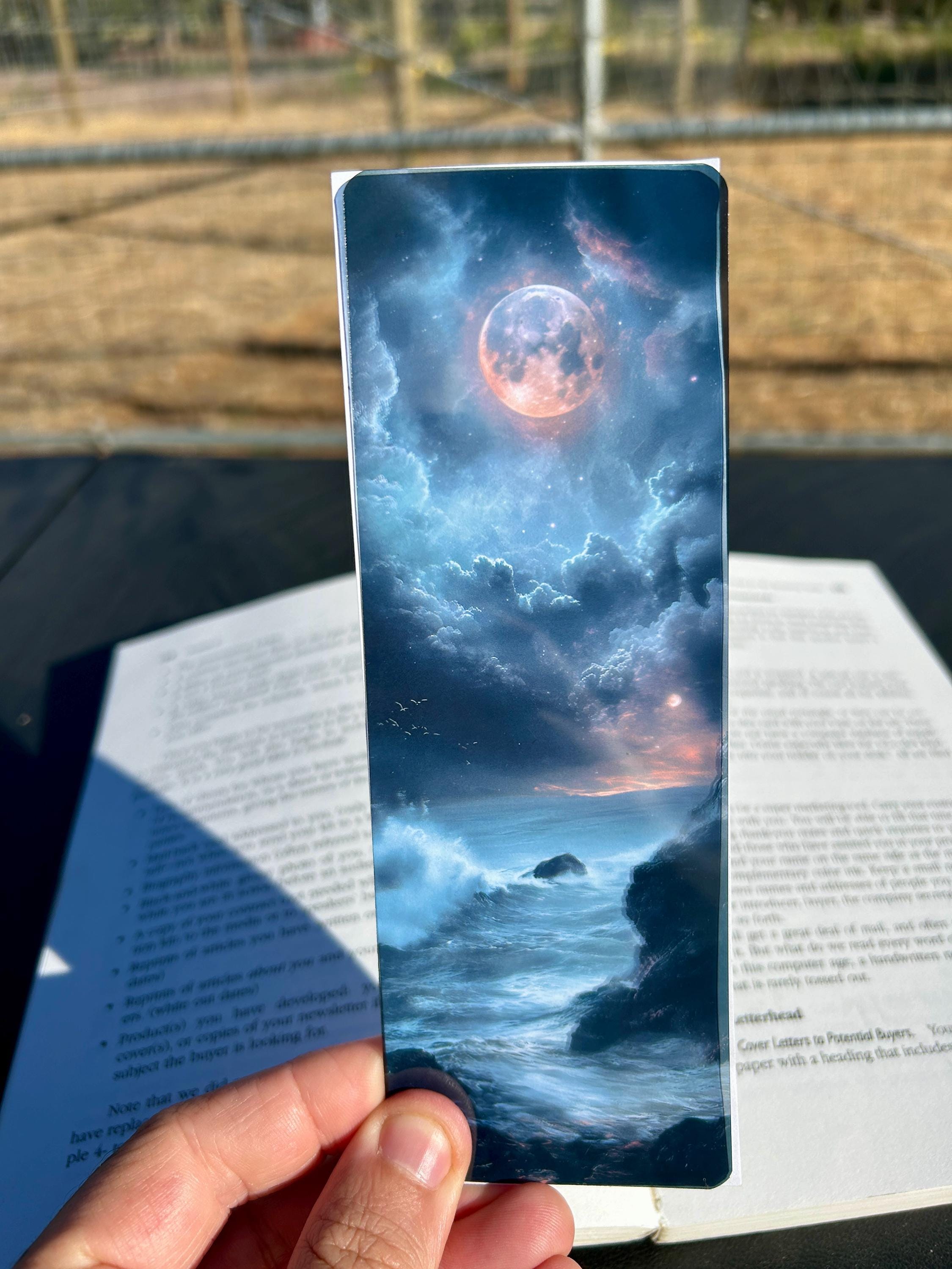Moon Ocean Bookmark – Crashing Waves & Dreamy Night Sky | Fantasy Ocean is a decorative bookmark made for readers, book lovers, collectors, book clubs, and giftable literary moments. It is designed as a reading accessory for books, journals, planners, and cozy reader gifts.