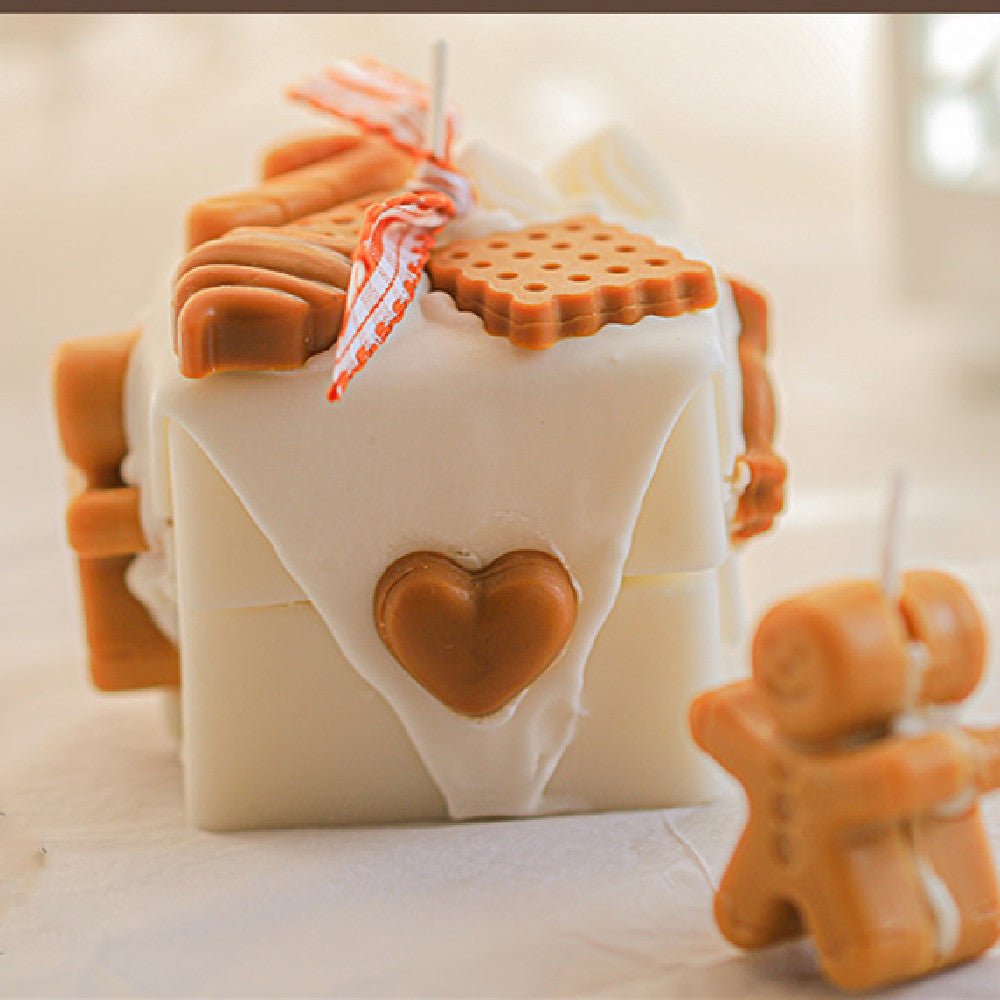 Velas aromáticas de Navidad de hombre de jengibre caseras
