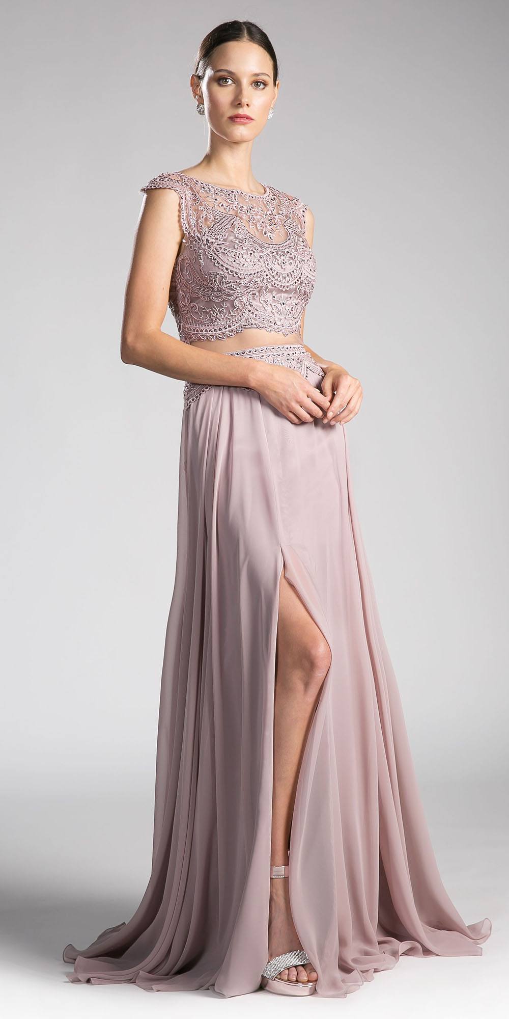 Cinderella Divine CD0113 Illusion Beaded Formal Gown Cap Sleeves is a formal gown suited for prom, pageants, weddings, galas, and black-tie occasions. It offers supplier-listed styling details with formalwear appeal for Honey Badger Books shoppers.
