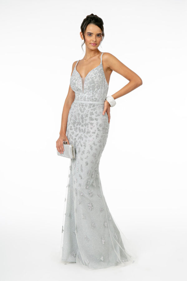 Glitter Mesh Mermaid Long Dress is a women's dress selected for daily outfits, summer plans, brunch, travel, casual events, and wardrobe refreshes. Design details include Tulle fabric; Illusion V-Neck Sleeve: Spaghetti Strap Back: Open, Zipper Embellishment: Glitter Silhouette: Mermaid neckline/strap detail. It helps customers compare style, fit, fabric, occasion, season, and available variant options before purchase.