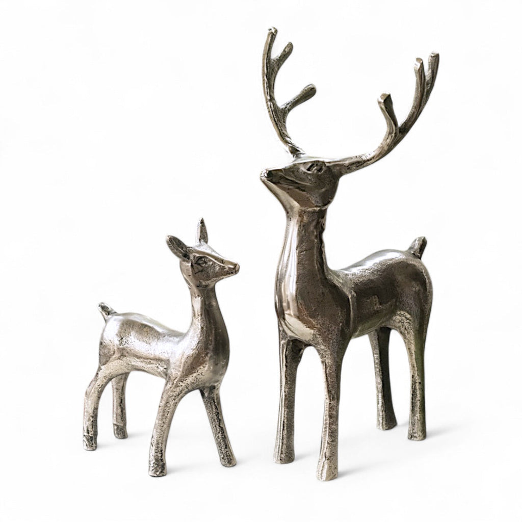 Pewter Aluminum Reindeer and Calf Figurines | 2 Styles is a metal reindeer figurine selected for mantels, shelves, trees, stockings, entryways, holiday displays, and seasonal gift giving. Holiday styling makes it useful for mantels, shelves, entryways, trees, stockings, and seasonal displays. A seasonal choice for holiday decorators, collectors, hosts, ornament lovers, and festive gift giving. Available style options help shoppers choose the right version from the listing variants.