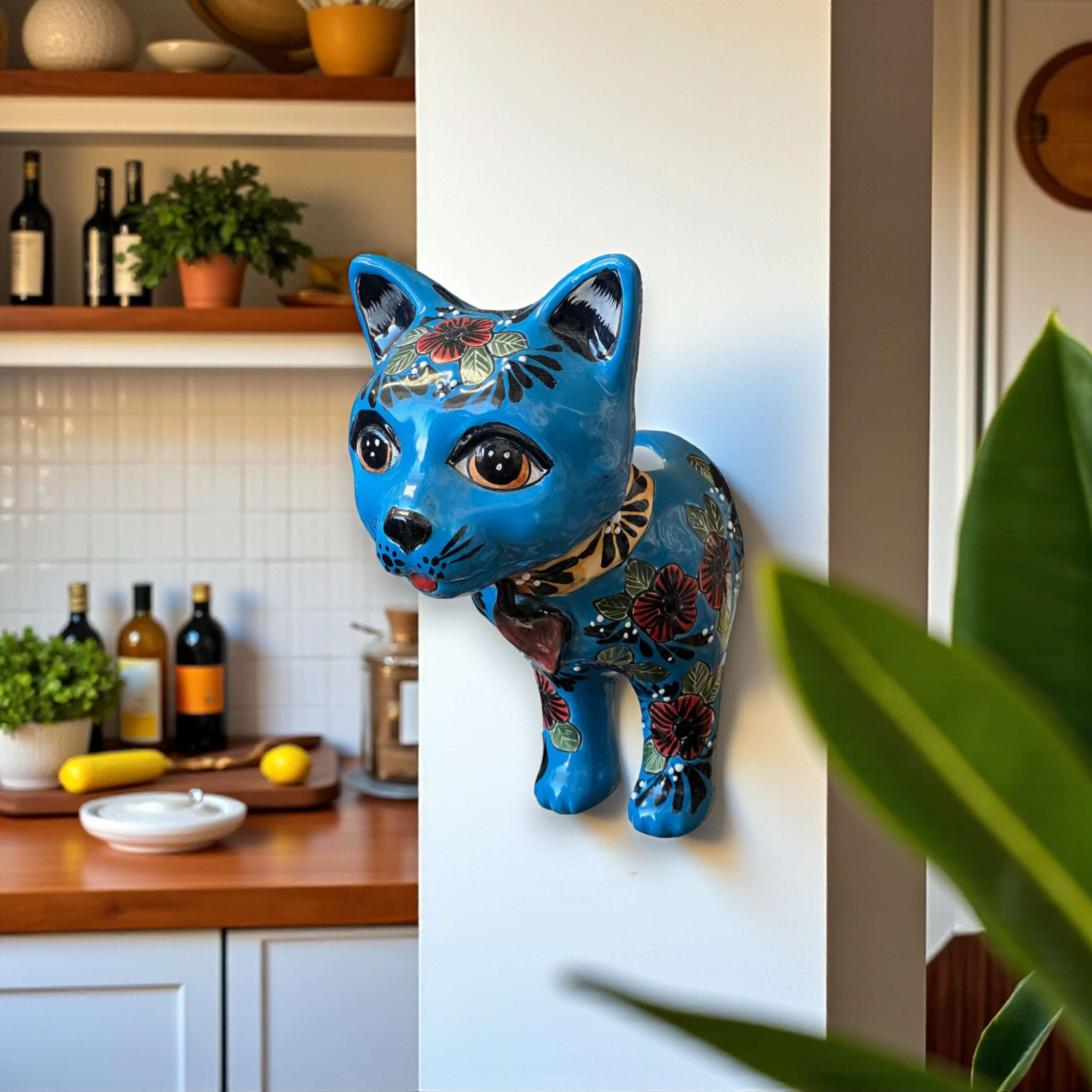 Talavera Cat Wall Planter | Hand-Painted Ceramic Art is a hand-painted ceramic planter made for plant displays, garden accents, windowsills, patio styling, and colorful home decor. It is a home and garden product made for decorative plant displays and giftable home styling.