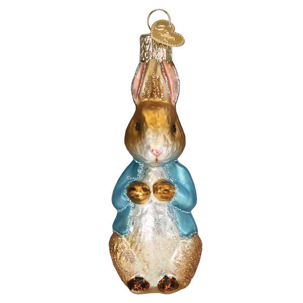 Peter Rabbit Ornament is a glass Christmas ornament selected for mantels, shelves, trees, stockings, entryways, holiday displays, and seasonal gift giving. Holiday styling makes it useful for mantels, shelves, entryways, trees, stockings, and seasonal displays. A seasonal choice for holiday decorators, collectors, hosts, ornament lovers, and festive gift giving. Listing details help shoppers compare the item type, use, style, and intended recipient before purchase.